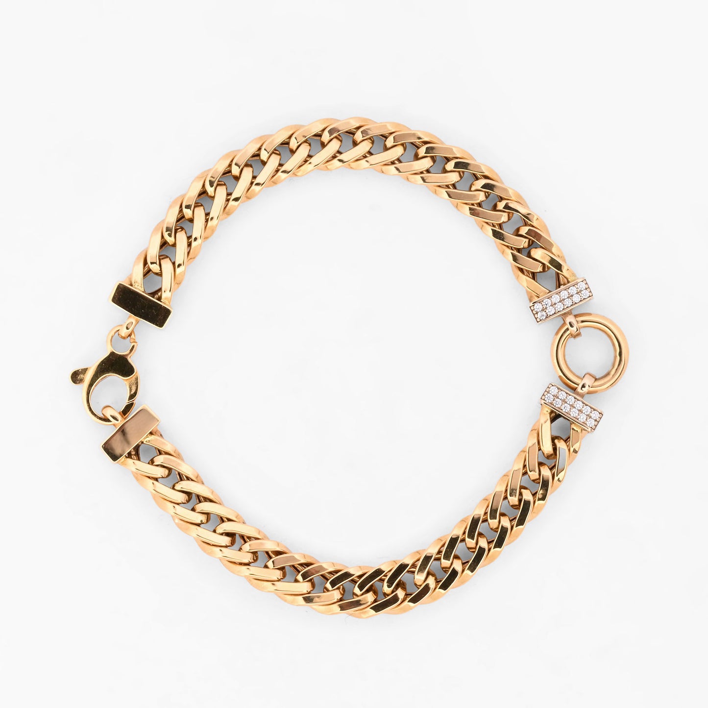 Pulsera barbada de oro amarillo 18kt con un motivo central circular flanqueado por barritas pavé de diamantes de xxcts. Pieza certificada y envío gratuito