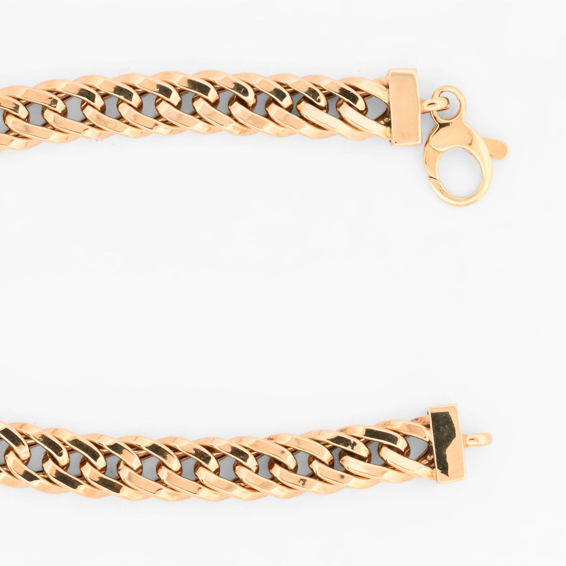 Pulsera barbada de oro amarillo 18kt con un motivo central circular flanqueado por barritas pavé de diamantes de xxcts. Pieza certificada y envío gratuito