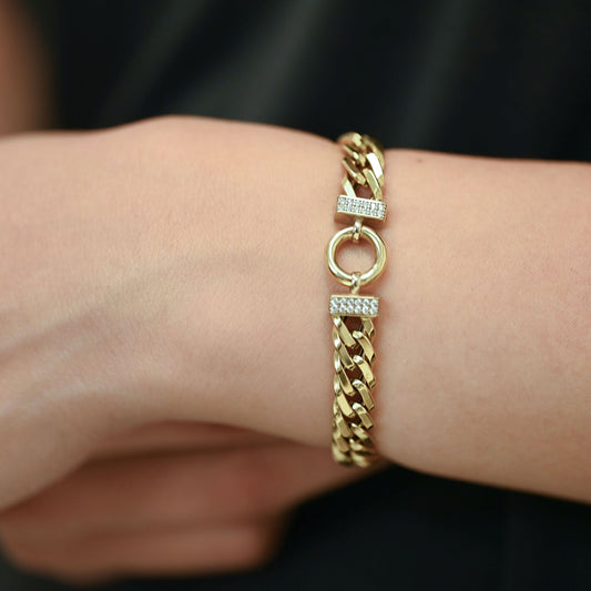 Pulsera tipo barbada de oro amarillo de 18kt con circonitas - 20131P