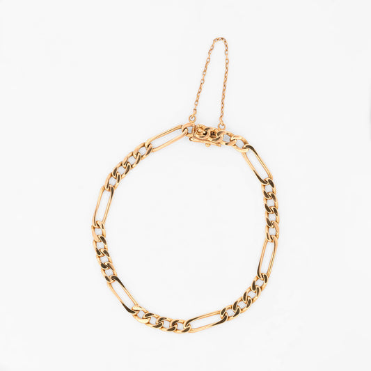 Comprar pulsera oro amarillo de 18kt con cadena alterna barbada. La cadena mide 21cm y dispone de cierre con cadena de seguridad. Envio gratuito