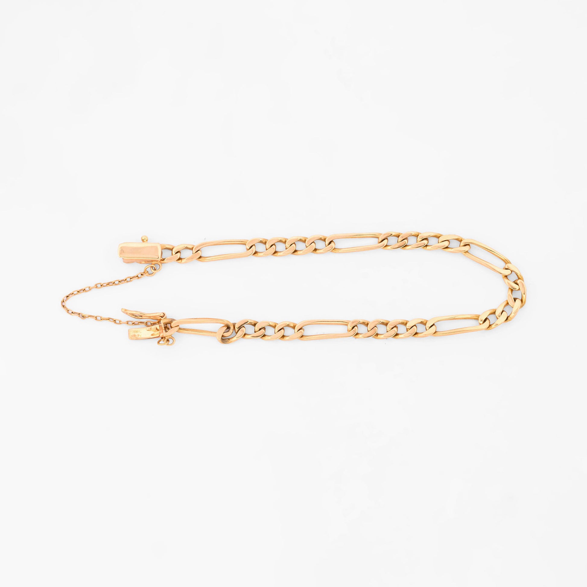 Comprar pulsera oro amarillo de 18kt con cadena alterna barbada. La cadena mide 21cm y dispone de cierre con cadena de seguridad. Envio gratuito