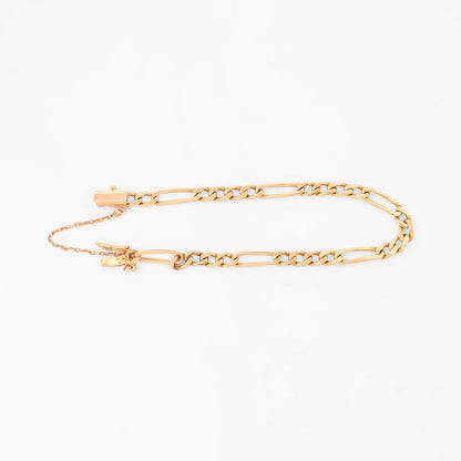 Comprar pulsera oro amarillo de 18kt con cadena alterna barbada. La cadena mide 21cm y dispone de cierre con cadena de seguridad. Envio gratuito