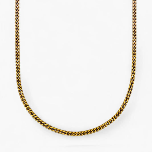 Comprar cadena barbada tipo cubana plana realizada en oro amarillo de 18kt. Cierre tipo mosquetón. Joya unisex. Joyas acondicionadas. Envío GRATIS. Ian'Or.