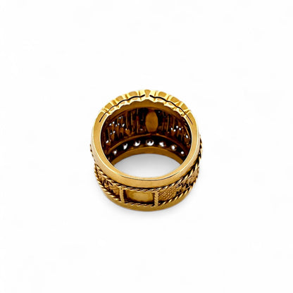 Comprar anillo ancho realizado en oro amarillo de 18kt con pavé redondo de brillantes en la parte central de 0,02ct y en la parte superior e inferior de 0,04ct.