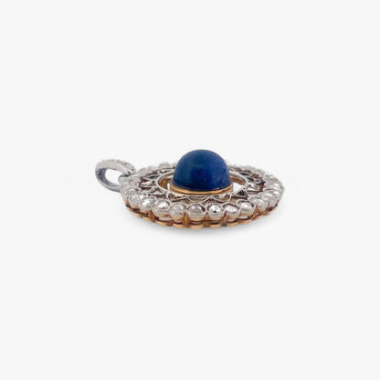 Colgante en forma de circulo realizado en oro blanco de 18kt una piedra central y diamantes alrededor. Joyas restauradas. Joyería Ian'Or. Envío gratis.