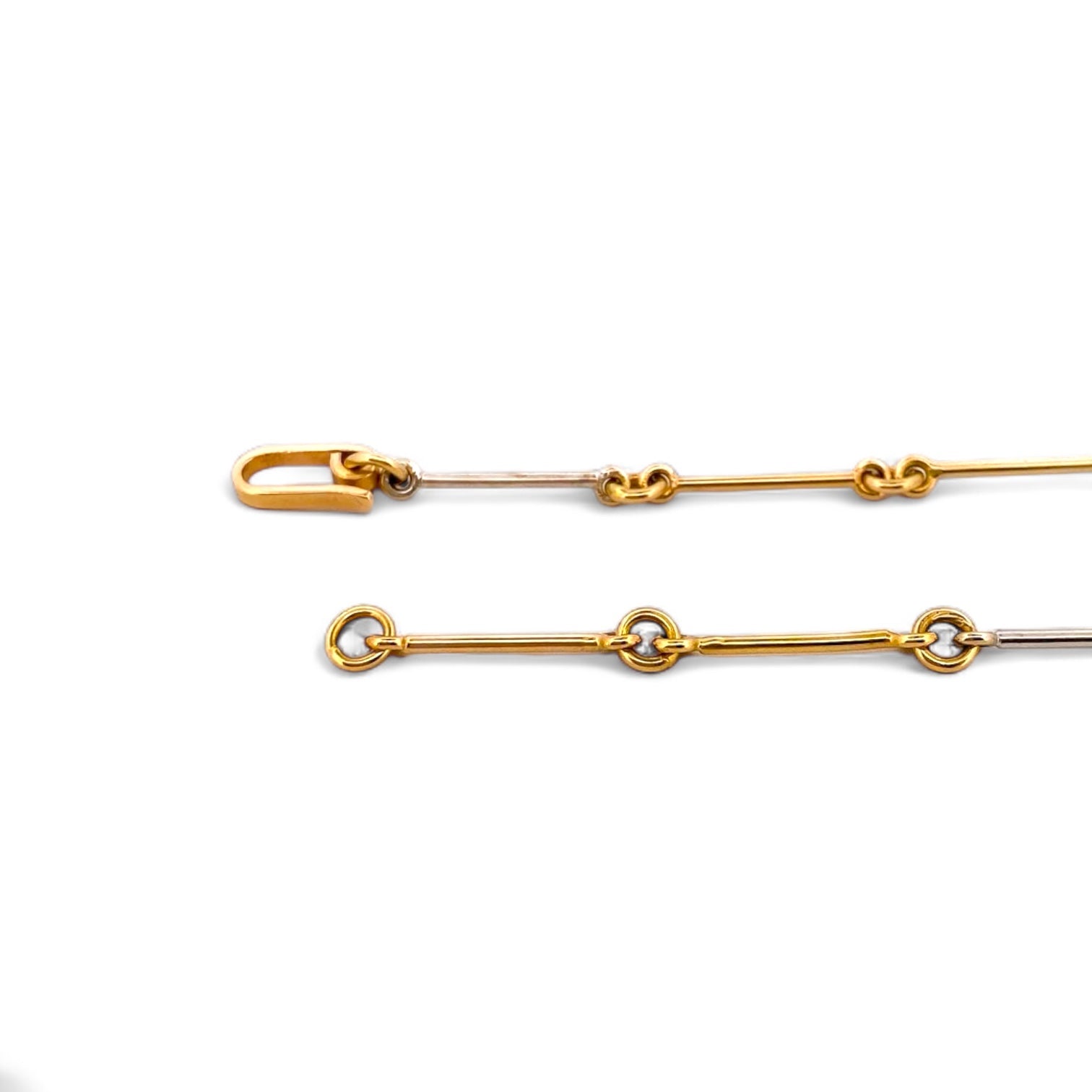 Comprar collar bicolor semirrígido realizado en oro blanco y amarillo de 18kt de 41,2cm de largo con diamantes talla brillante y cierre tipo gancho. Ian'Or.
