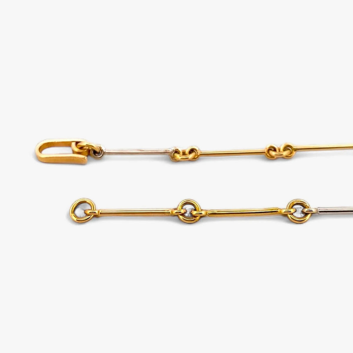 Comprar collar bicolor semirrígido realizado en oro blanco y amarillo de 18kt de 41,2cm de largo con diamantes talla brillante y cierre tipo gancho. Ian'Or.