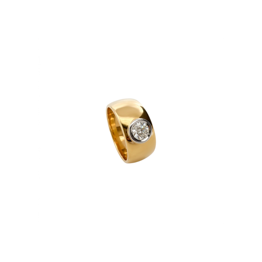 Comprar anillo ancho realizado en oro amarillo de 18kt con un diamante talla brillante de 0,25ct. Anillos de segunda mano. Joyería Ian'Or. Envío gratis. 
