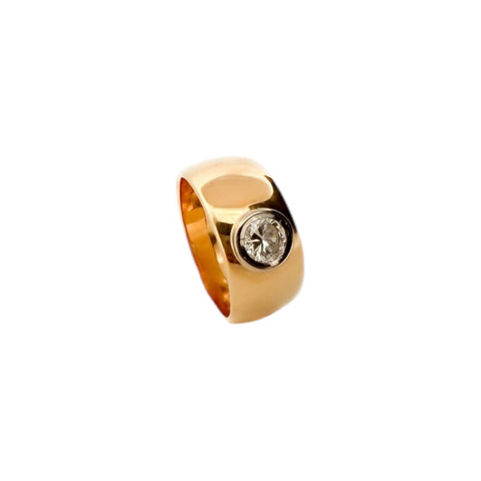 Comprar anillo ancho realizado en oro amarillo de 18kt con un diamante talla brillante de 0,25ct. Anillos de segunda mano. Joyería Ian'Or. Envío gratis.