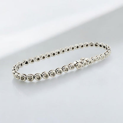 Pulsera en oro blanco Riviere de 18kt con 40 diamantes talla brillante. Medidas 17cm largo. Riviere en Ian'Or. Joyas de segunda mano. Joyería Ian'Or.