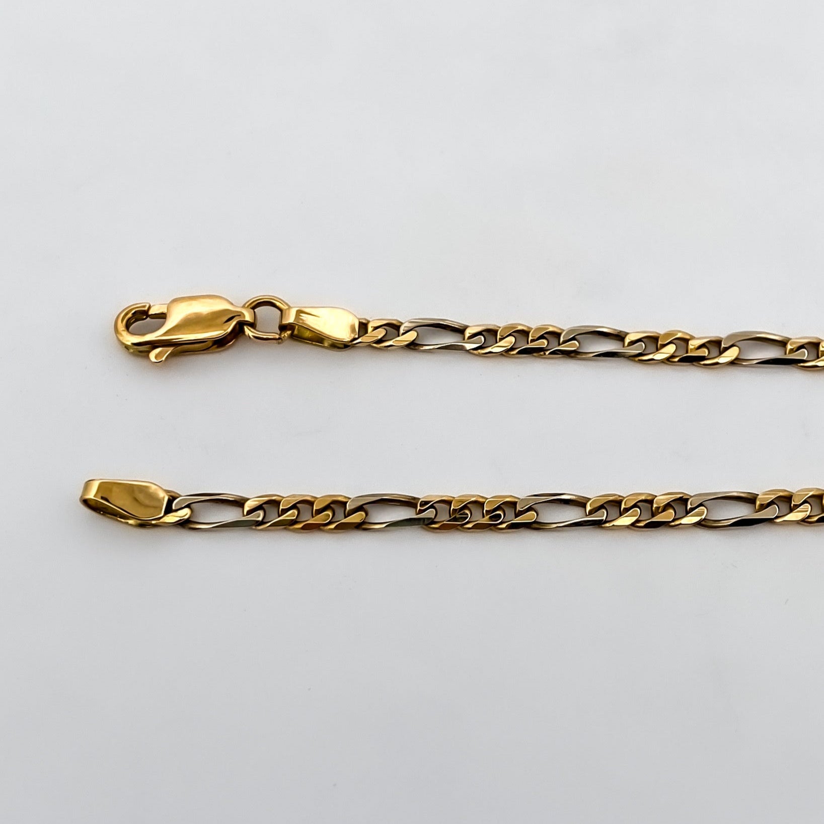 Comprar collar con cadena alterna barbada en oro amarillo de 18kt y cierre tipo mosquetón. Joya unisex. Joyas acondicionadas. Envío GRATIS. Ian'Or.
