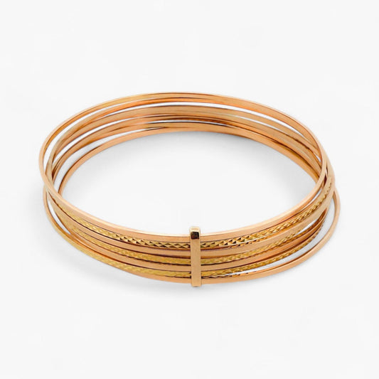 Comprar pulsera realizada en oro amarillo de 18kt con siete bandas unidas. Compra de joyas al mejor precio en Barcelona. Joyería Ian'Or. Envío gratis.
