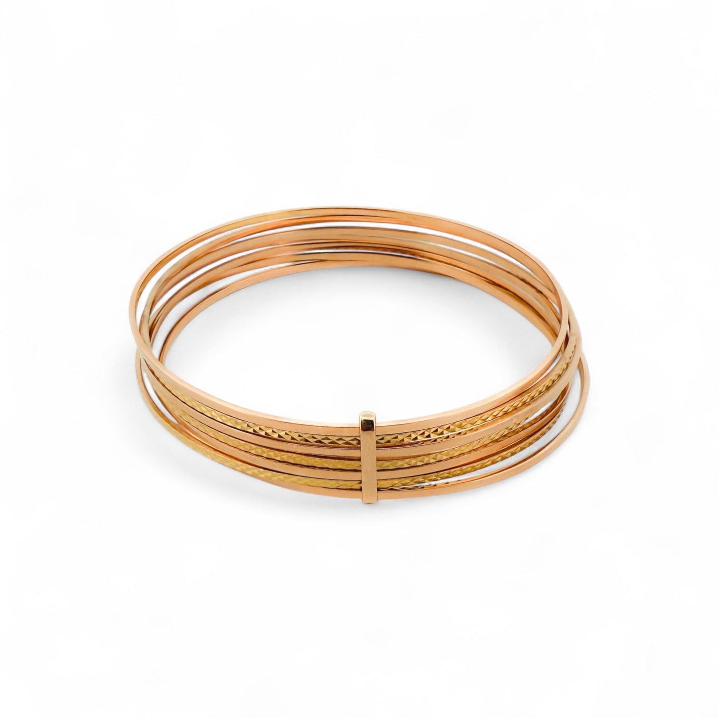 Comprar pulsera realizada en oro amarillo de 18kt con siete bandas unidas. Compra de joyas al mejor precio en Barcelona. Joyería Ian'Or. Envío gratis.
