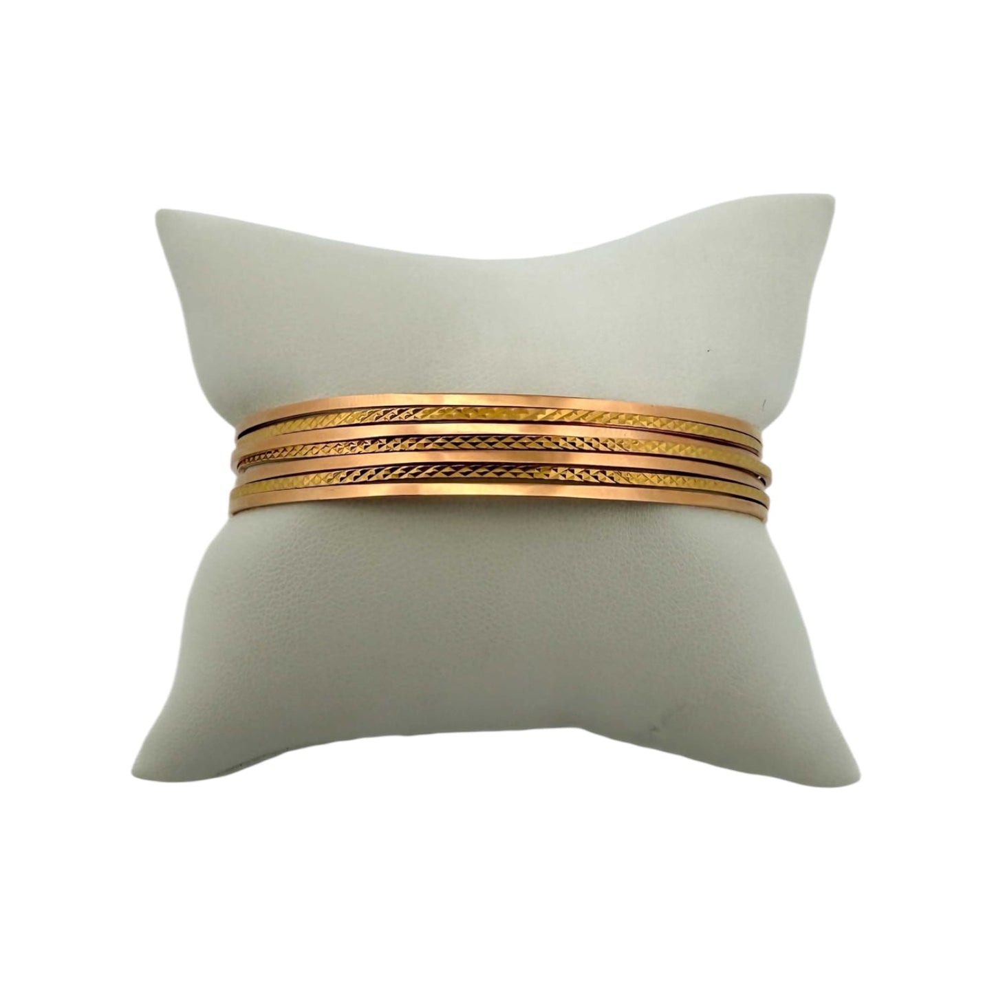 Comprar pulsera realizada en oro amarillo de 18kt con siete bandas unidas. Compra de joyas al mejor precio en Barcelona. Joyería Ian'Or. Envío gratis.
