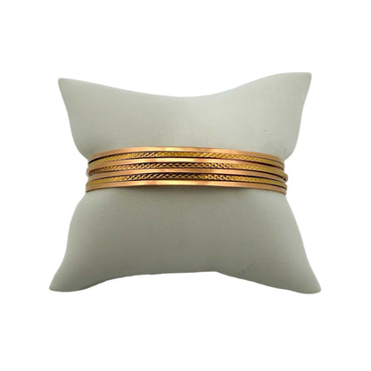 Comprar pulsera realizada en oro amarillo de 18kt con siete bandas unidas. Compra de joyas al mejor precio en Barcelona. Joyería Ian'Or. Envío gratis.
