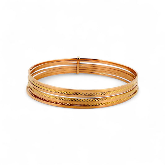Comprar pulsera realizada en oro amarillo de 18kt con siete bandas unidas. Compra de joyas al mejor precio en Barcelona. Joyería Ian'Or. Envío gratis.
