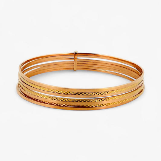 Comprar pulsera realizada en oro amarillo de 18kt con siete bandas unidas. Compra de joyas al mejor precio en Barcelona. Joyería Ian'Or. Envío gratis.
