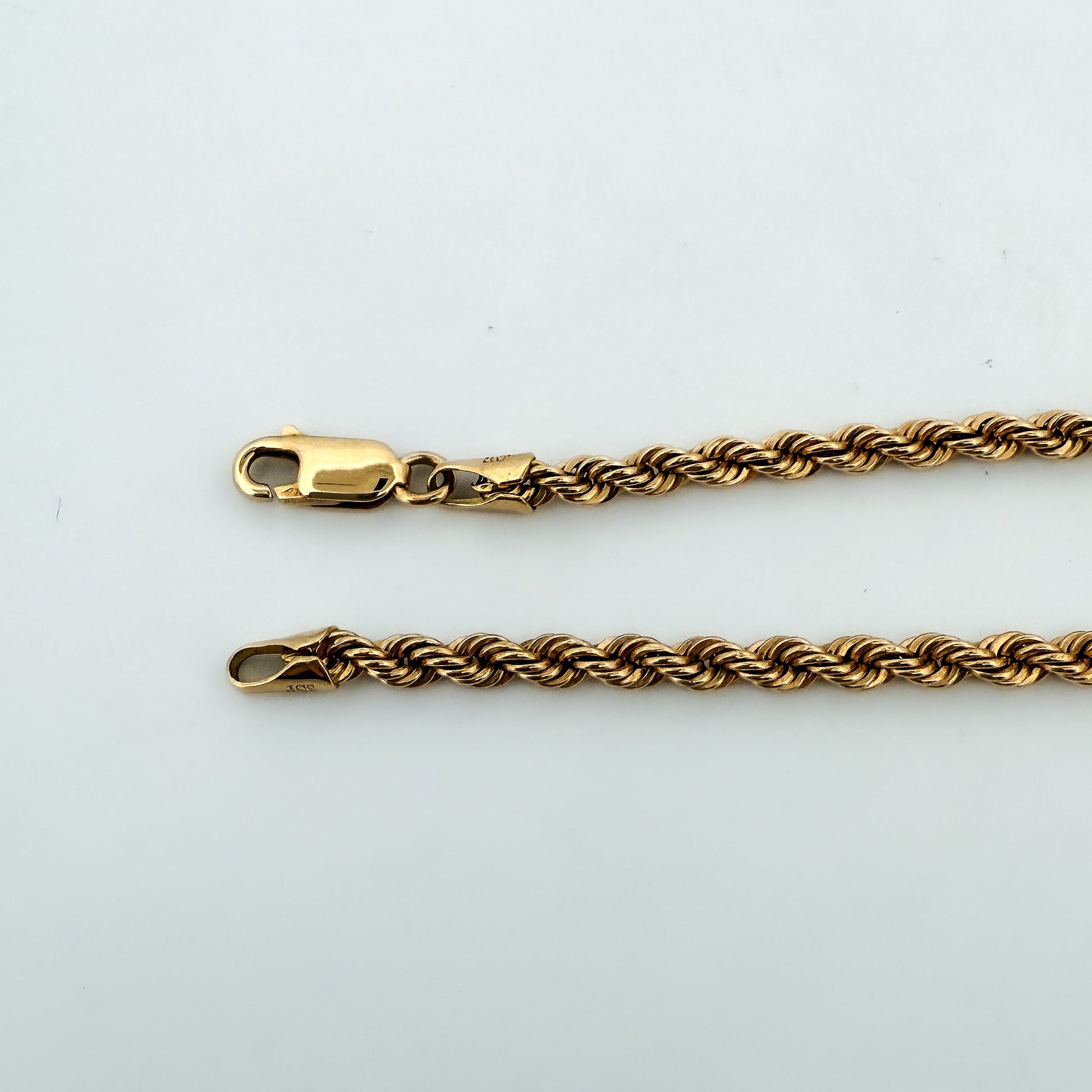 Comprar collar de oro amarillo de 18kt con cadena de cordón salomónico. La cadena mide 60,5cm de largo y dispone de cierre tipo mosquetón. Joyería Ian'Or.

