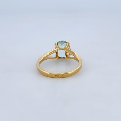 Comprar anillo realizado en oro amarillo de 18kt con agua marina talla oval engastada en 4 grapas. Anillos de segunda mano. Joyería Ian'Or. Envío GRATIS.

