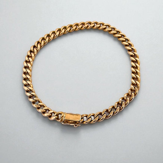Comprar pulsera oro amarillo de 18kt con cadena tipo cubana. La pulsera mide 21cm de largo y 5,43mm de grosor. Cierre tipo mosquetón y brazo de seguridad.