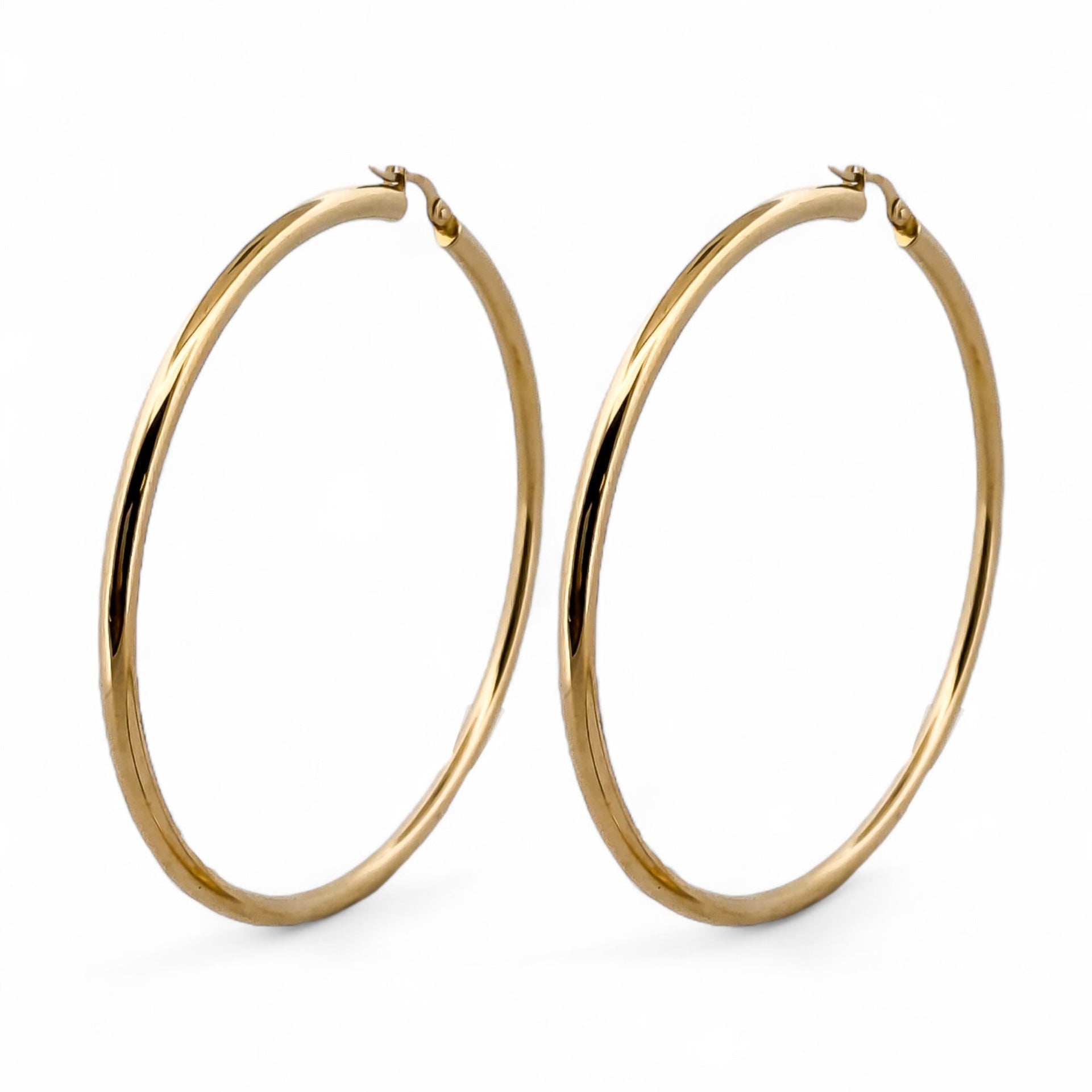 Comprar pendientes aro lisos en oro amarillo de 18kt de 66mm de diámetro y 3,03mm de grosor. Cierre tipo criolla. Joyería Ian'Or. Envío GRATIS. Ian'Or.

