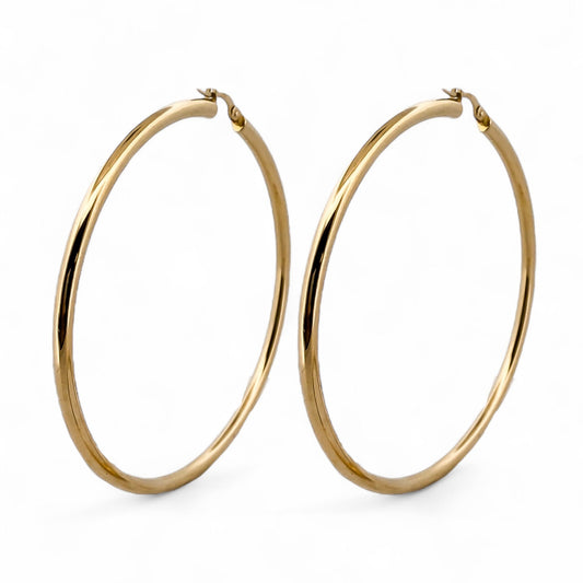 Comprar pendientes aro lisos en oro amarillo de 18kt de 66mm de diámetro y 3,03mm de grosor. Cierre tipo criolla. Joyería Ian'Or. Envío GRATIS. Ian'Or.

