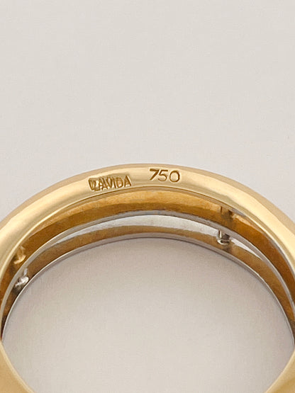 Comprar anillo de tres aros, dos de ellos realizado en oro amarillo de 18kt y el otro realizado en oro blanco. Joyeria Ian Or.