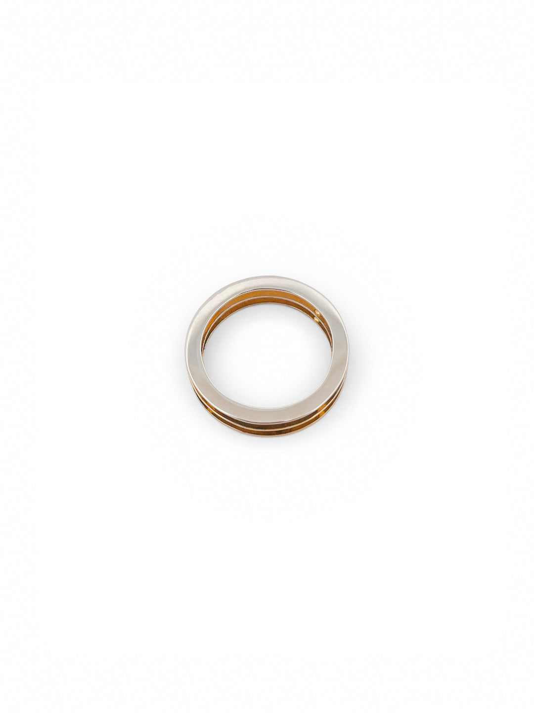 Comprar anillo de tres aros, dos de ellos realizado en oro amarillo de 18kt y el otro realizado en oro blanco. Joyeria Ian Or.
