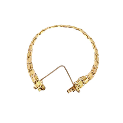 Comprar Pulsera oro amarillo de 18kt con malla semirrígida. La pulsera mide 17,3cm y dispone de cierre tipo cajón. Pulseras oro 18kt al mejor precio. Ian'Or.