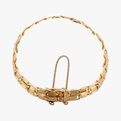 Comprar Pulsera oro amarillo de 18kt con malla semirrígida. La pulsera mide 17,3cm y dispone de cierre tipo cajón. Pulseras oro 18kt al mejor precio. Ian'Or.