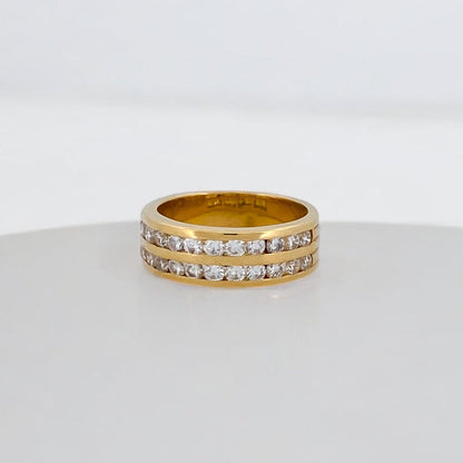 Comprar media alianza de dos carriles realizada en oro amarillo de 18kt con 22 diamantes talla brillante. Envío gratis. Joyería Ian'Or. Joyas con diamantes.