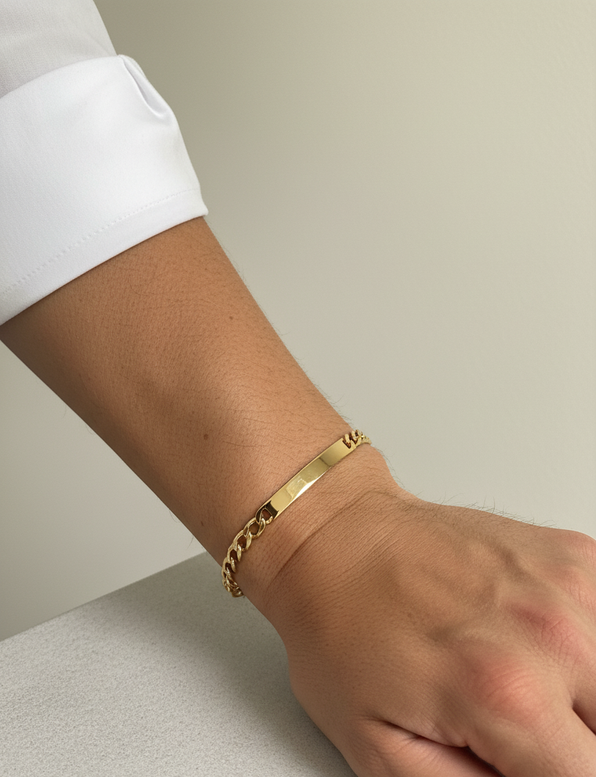 Pulsera no me olvides realizada oro amarillo de 18kt con cadena tipo cubana alterna 3x1 y una placa central. Pulseras de oro 18kt para hombre baratas

