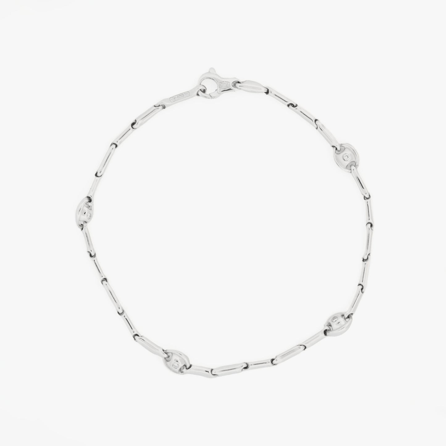 Pulsera semirrígida de oro blanco de 18kt con 8 diamantes talla brillante. Joyas de segunda mano en Barcelona. Joyería Compro Oro Barcelona. Joyas baratas. Joyas Chimento.