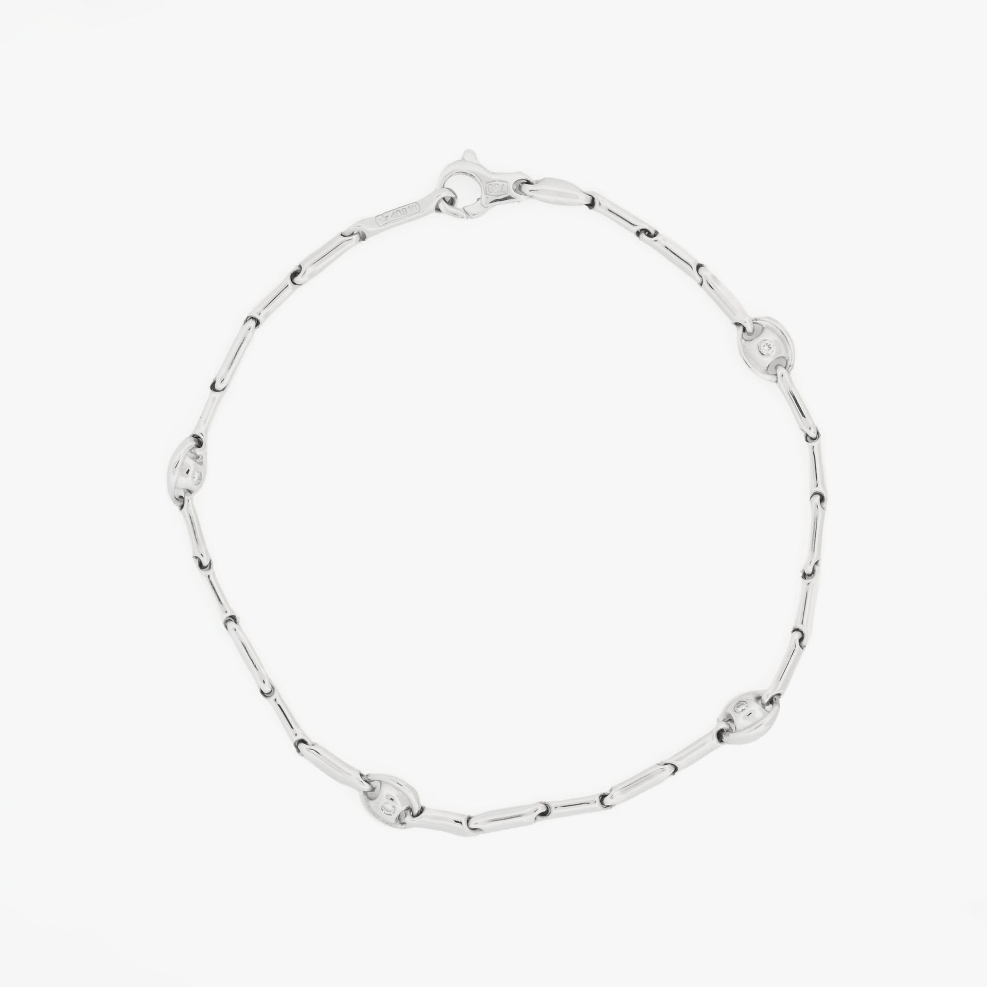 Pulsera semirrígida de oro blanco de 18kt con 8 diamantes talla brillante. Joyas de segunda mano en Barcelona. Joyería Compro Oro Barcelona. Joyas baratas. Joyas Chimento.