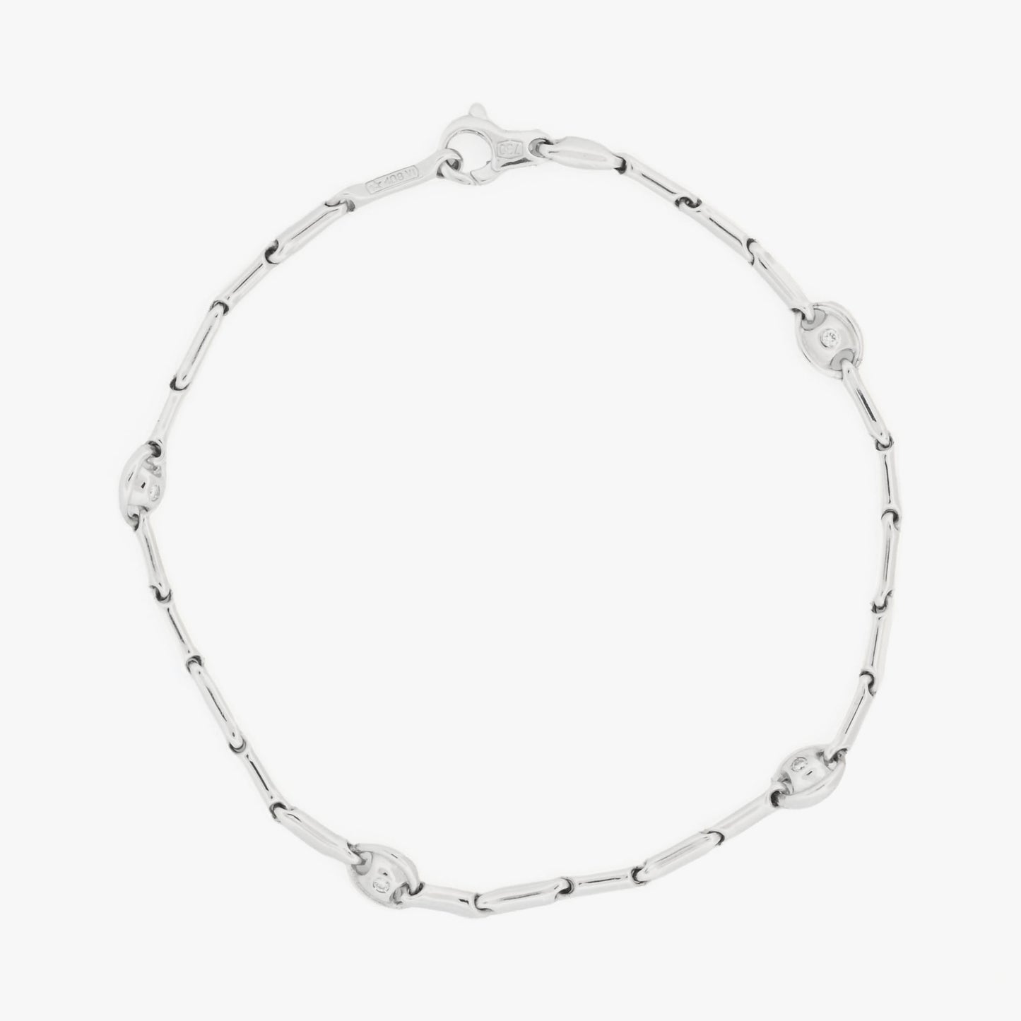 Pulsera semirrígida de oro blanco de 18kt con 8 diamantes talla brillante. Joyas de segunda mano en Barcelona. Joyería Compro Oro Barcelona. Joyas Chimento.