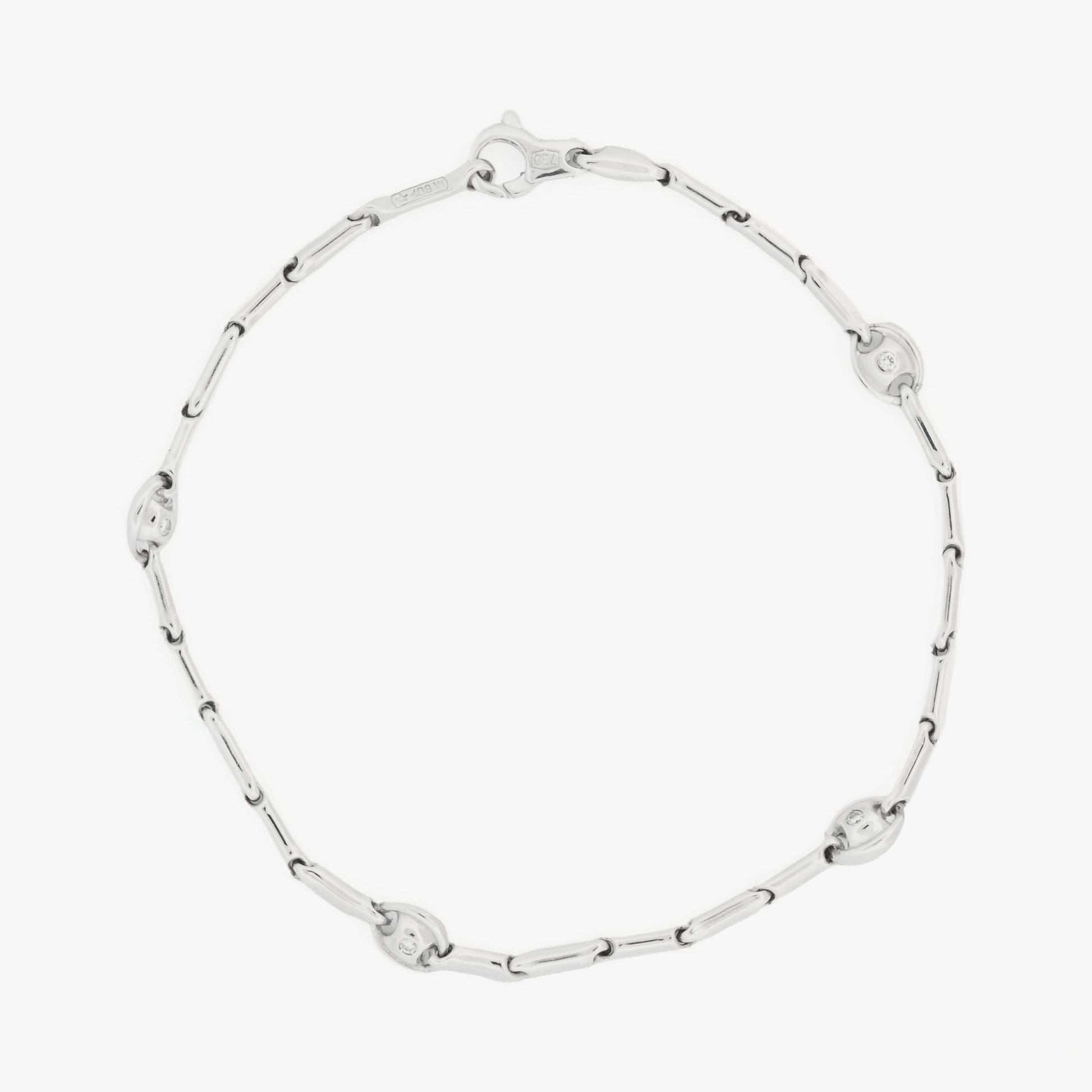 Pulsera semirrígida de oro blanco de 18kt con 8 diamantes talla brillante. Joyas de segunda mano en Barcelona. Joyería Compro Oro Barcelona. Joyas Chimento.