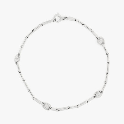 Pulsera semirrígida de oro blanco de 18kt con 8 diamantes talla brillante. Joyas de segunda mano en Barcelona. Joyería Compro Oro Barcelona. Joyas Chimento.