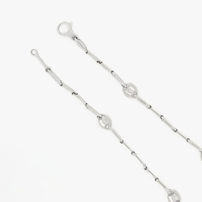 Pulsera semirrígida de oro blanco de 18kt con 8 diamantes talla brillante. Joyas de segunda mano en Barcelona. Joyería Compro Oro Barcelona. Joyas Chimento.