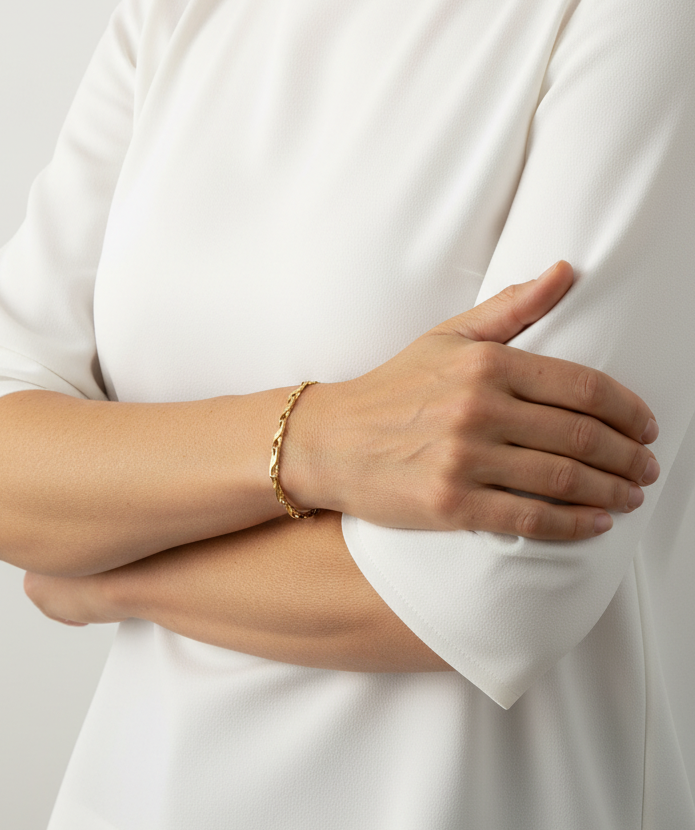 Pulsera oro amarillo de 18kt con eslabones en forma de infinito. Cierre tipo mosquetón.. Comprar pulseras de oro al mejor precio en Barcelona