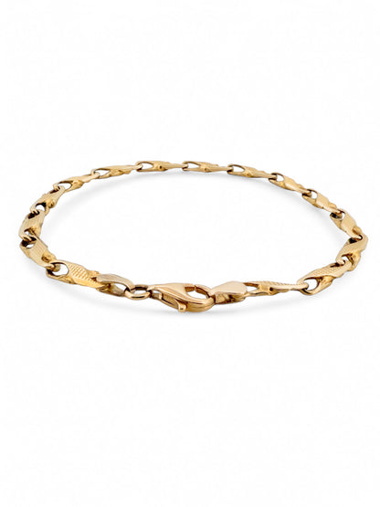 Pulsera oro amarillo de 18kt con eslabones en forma de infinito. Cierre tipo mosquetón.. Comprar pulseras de oro al mejor precio en Barcelona