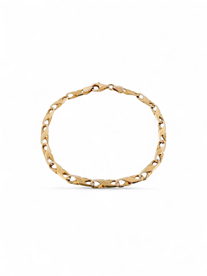 Pulsera oro amarillo de 18kt con eslabones en forma de infinito. Cierre tipo mosquetón.. Comprar pulseras de oro al mejor precio en Barcelona