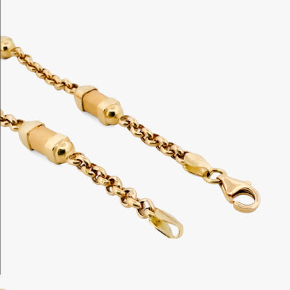 Pulsera oro amarillo de 18kt con cadena tipo rolo y 4 barriles alternos. La pulsera mide 20cm y 4,80mm de grosor. Pieza certificada y envío gratuito