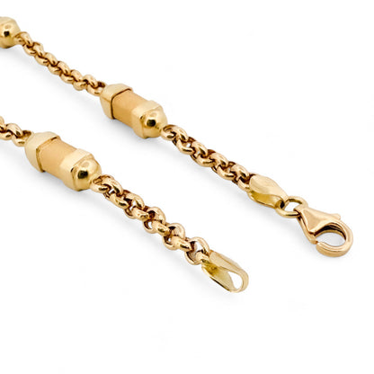 Pulsera oro amarillo de 18kt con cadena tipo rolo y 4 barriles alternos. La pulsera mide 20cm y 4,80mm de grosor. Dispone de cierre tipo mosquetón. Compra de pulseras de oro al mejor precio en Barcelona. 