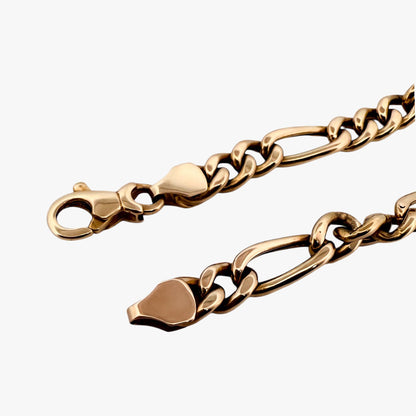 Pulsera oro amarillo de 18kt con cadena alterna. La cadena mide 19,5cm hace 11mm de grosor. Cierre tipo mosquetón.
