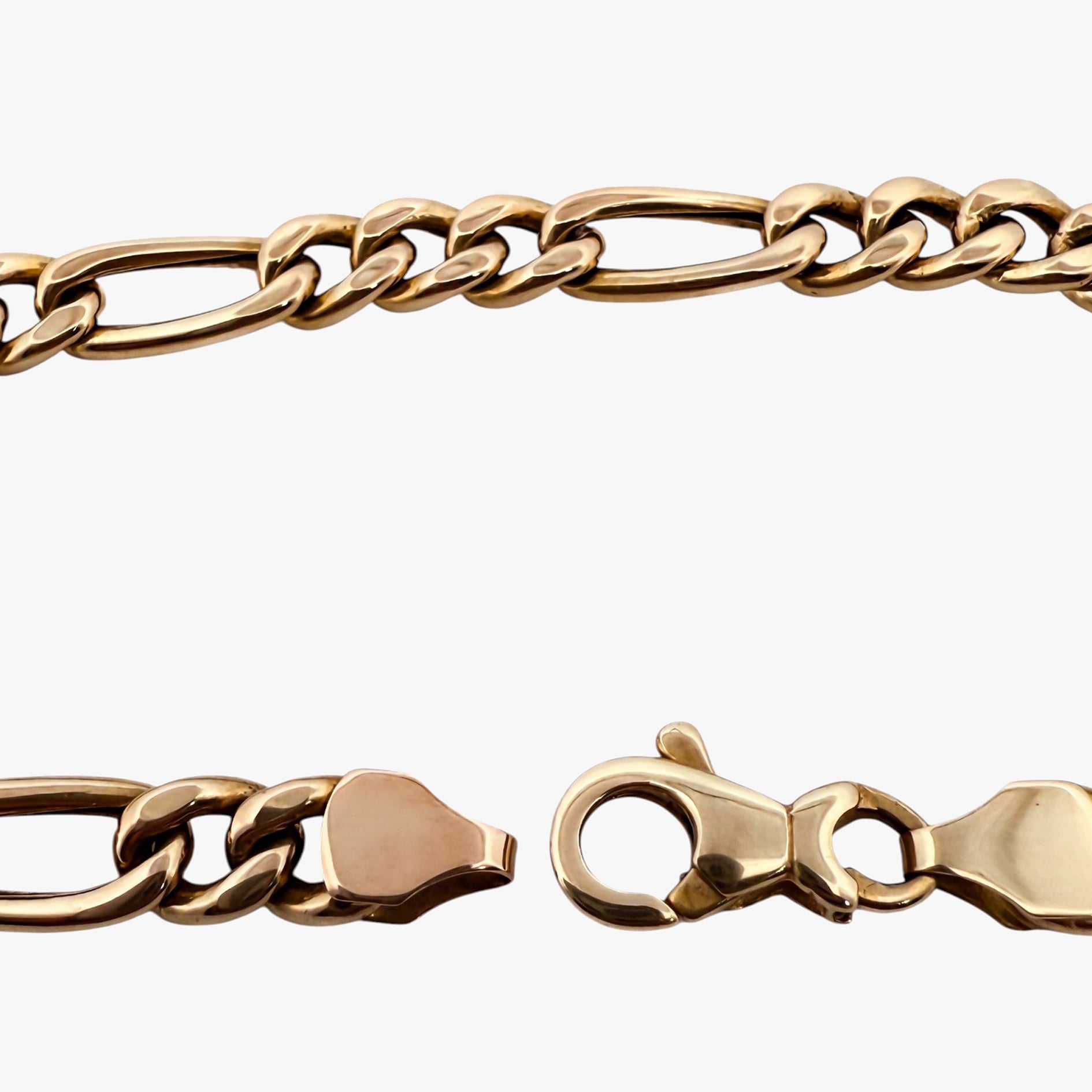 Pulsera oro amarillo de 18kt con cadena alterna. La cadena mide 19,5cm hace 11mm de grosor. Cierre tipo mosquetón.
