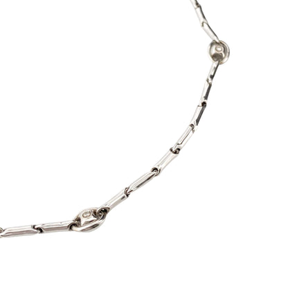 Collar de la firma italiana Chimento con cadena semirrígida oro blanco de 18kt con 14 diamantes talla brillante intercalados. Joyas de segunda mano alta gama. Joyería Compro Oro Barcelona. Joyas baratas.