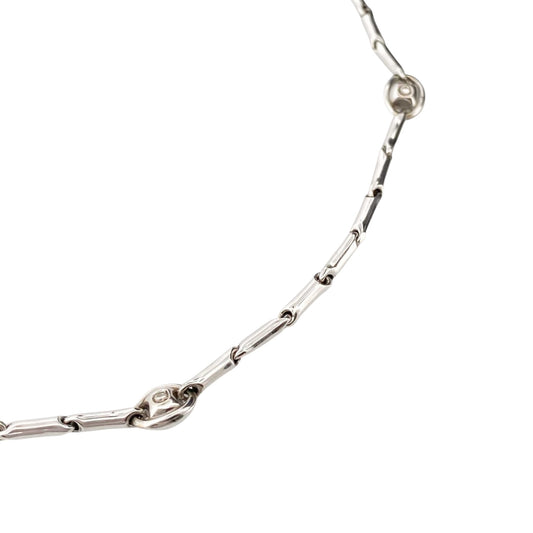 Collar de la firma italiana Chimento con cadena semirrígida oro blanco de 18kt con 14 diamantes talla brillante intercalados. Joyas de segunda mano alta gama. Joyería Compro Oro Barcelona. Joyas baratas.