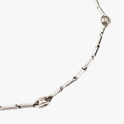 Collar de la firma italiana Chimento con cadena semirrígida oro blanco de 18kt con 14 diamantes talla brillante intercalados. Joyas de segunda mano alta gama. Joyería Compro Oro Barcelona. Joyas baratas.