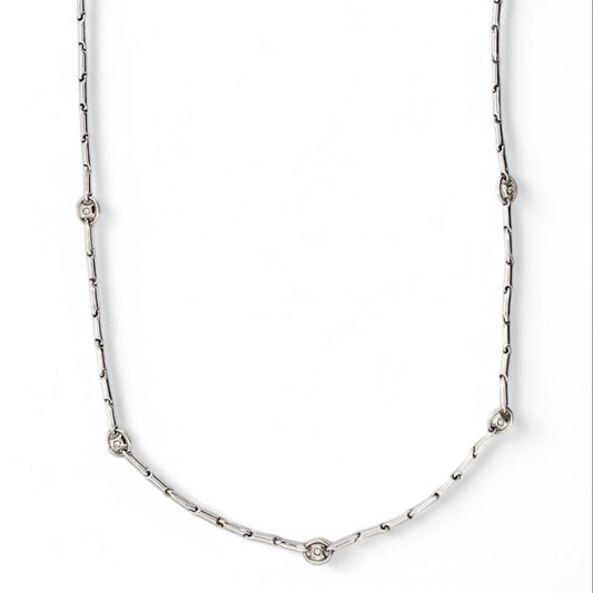 Collar de la firma italiana Chimento con cadena semirrígida oro blanco de 18kt con 14 diamantes talla brillante intercalados. Joyas de segunda mano alta gama. Joyería Compro Oro Barcelona. Joyas baratas.