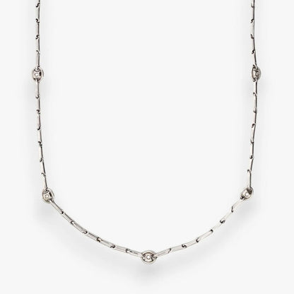 Collar de la firma italiana Chimento con cadena semirrígida oro blanco de 18kt con 14 diamantes talla brillante intercalados. Joyas de segunda mano alta gama. Joyería Compro Oro Barcelona. Joyas baratas.